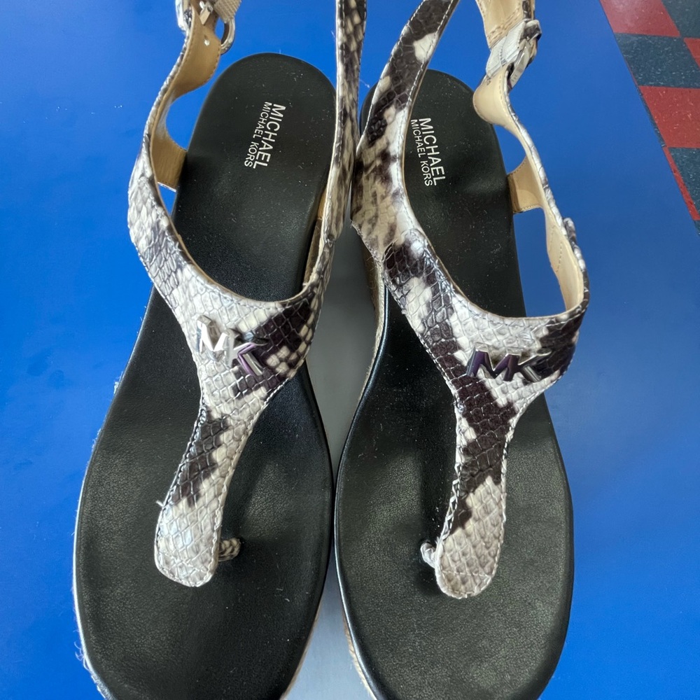 Brand new Michael Kors wedges.